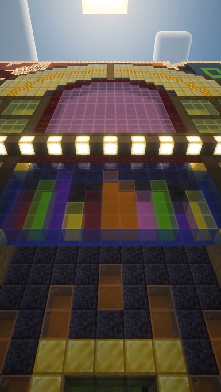 Low camera push down a street toward the giant jukebox building at spawn on the JukeZone Minecraft server